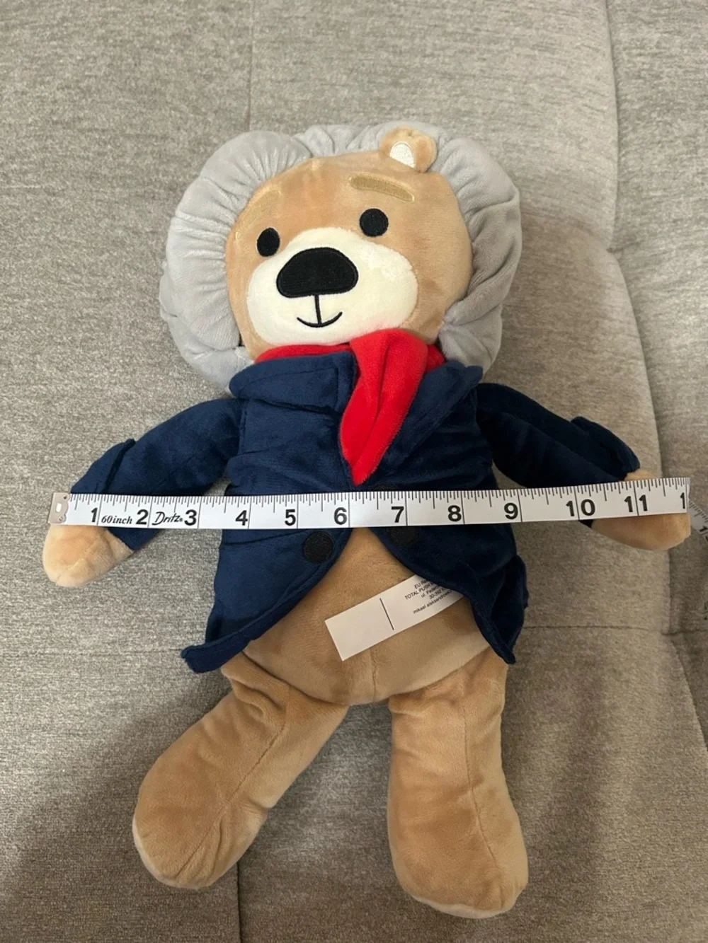 Plush Lion in Navy Jacket with Red Scarf
